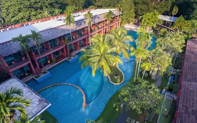 an aerial view of a resort with a swimming pool at Mai Morn Resort SHA Plus in Phuket Town