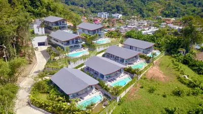 an aerial view of a villa with a resort at Himmapana Villas - Terraces - SHA Extra Plus in Kamala Beach