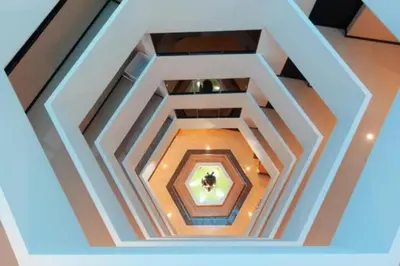an overhead view of a coffered ceiling in a building at Mai Khao Beach Condo by VillaCarte in Mai Khao Beach