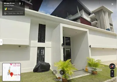 a rendering of a white house with an open door at CYAN Resort Kamala Beach Apartments Condominiums in Kamala Beach