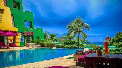 a view of the pool at a resort at Kata Beach Aspasia Boutique Apartment in Kata Beach