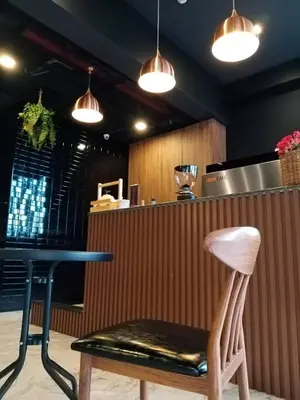 a chair sitting next to a counter in a restaurant at Aonang Dugong-SHA Extra Plus in Ao Nang Beach