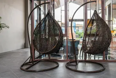 two baskets on display in a room at Apartment at Palmyrah Surin by Lofty in Surin Beach
