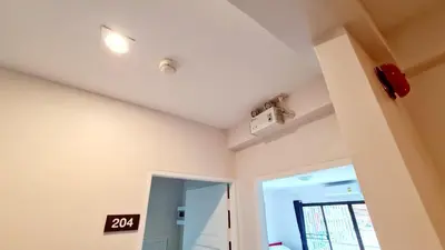 a room with a ceiling with a light on it at TP House@Naka in Phuket Town