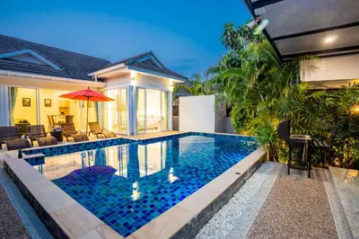 a swimming pool in the backyard of a house at 3 Bedroom Exclusive Private Pool Villa Smooth as Silk in Ao Nang Beach