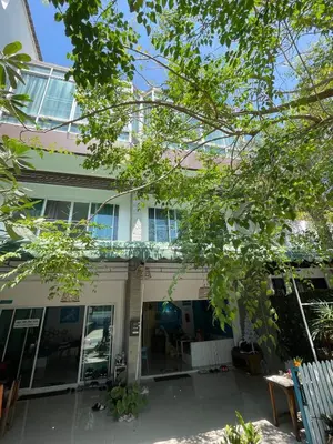 an image of a house with the front door open at Baan Oui guest house - Nai Harn in Phuket Town