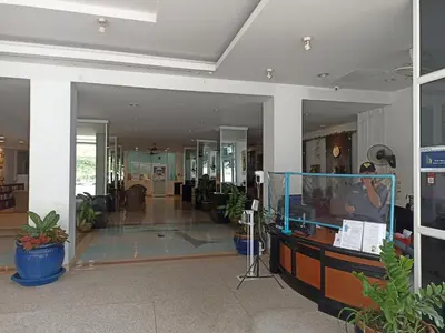 a lobby of a building with a fish tank at Patong beach apartment for up to 4 person in Patong Beach