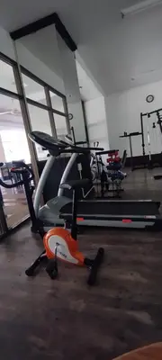 a gym with a treadmill and a exercise bike at Patong beach apartment for up to 4 person in Patong Beach