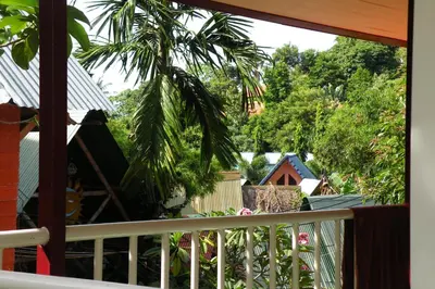 a view from the balcony of a house at Coco's Guest House in Phi Phi Don