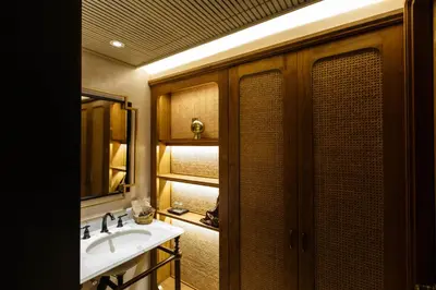 a bathroom with a sink and a mirror at Hotel Verdigris in Phuket Town