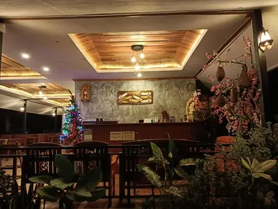 a christmas tree in the dining room of a restaurant at The mantra resort in Ko Yao Yai