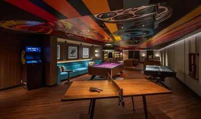 a billiard room with a pool table and a pool table at Hyatt Regency Phuket Resort in Kamala Beach