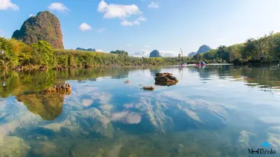 a river with rocks in the water at Krabi Klong Muang Bay Resort in Klong Muang Beach