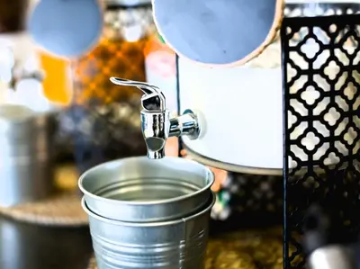 a mixer sitting on top of a tin on a counter at Anchor Boutique House in Patong Beach