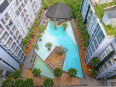 an overhead view of a swimming pool in a building at Suite Celeste 1BR Sunset RooftopCitygate Kamala in Kamala Beach
