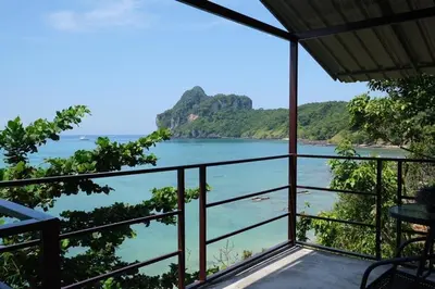 a view of the ocean from the balcony of a house at Phi Phi Seaside Bungalow in Phi Phi Don