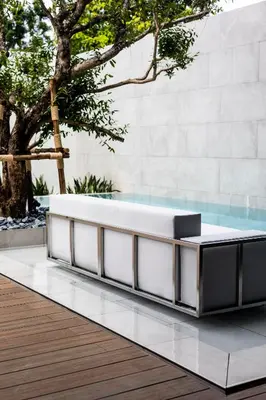 a bathtub in the middle of a wooden deck at Mono Oxygen Modern Pool Villas- Bangtao Beach in Phuket Town