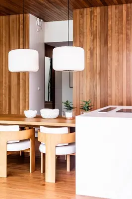 a dining room with a table and chairs at Mono Oxygen Modern Pool Villas- Bangtao Beach in Phuket Town