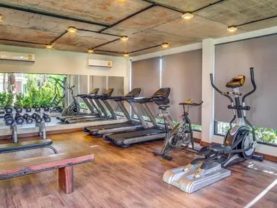a gym with a bunch of exercise bikes in it at The Title Rawai Beachfront (Sea paradise) in Rawai Beach