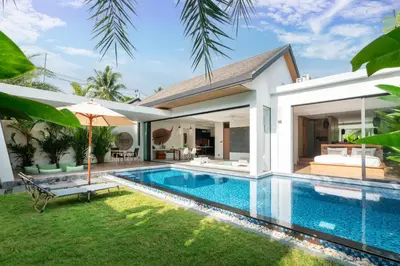 a swimming pool in the backyard of a villa at Eden Escape Naiyang Beach in Phuket Town