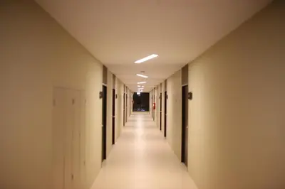 an empty corridor in an office building at Naka Residence in Phuket Town