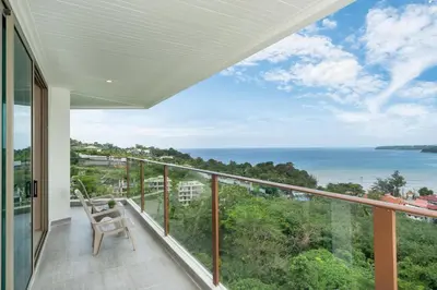 a balcony with a view of the ocean at Oceana Sea View - Kamala Beach in Kamala Beach