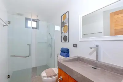a bathroom with a shower and a sink and a toilet at Loft-Style Hyper Modern 4Br Villa Sunset garden 6 with 12x5m Salt Pool in Rawai Beach