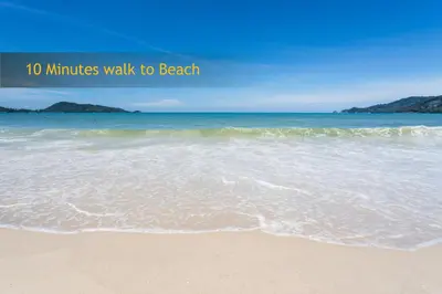 a beach with the words minutes walk to beach at Add Plus Hotel & SPA in Patong Beach