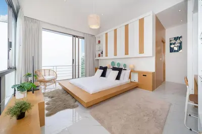 a bedroom with a bed and a large window at Villa Casa Koko - Luxury Modern Minimalism in Thalang