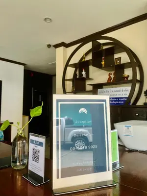 a table with a picture of a truck on it at Hill View Lodge in Patong Beach