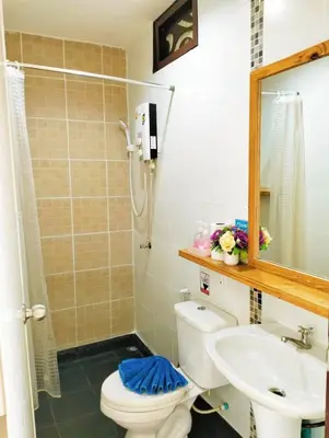 a bathroom with a toilet and a sink at Blue View House Phi Phi in Phi Phi Don