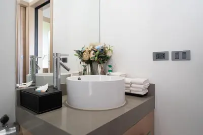 a bathroom with a large tub on a counter with towels at Sunpao Pool Villa by HCR in Layan Beach