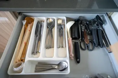 a white drawer filled with utensils in a kitchen at Sunpao Pool Villa by HCR in Layan Beach