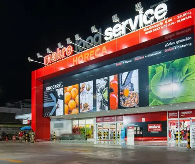 a store with a large sign on top of it at KATA BEACH OZONE Superb Fully Equipped studio kitchen washing machine aircon in Kata Beach