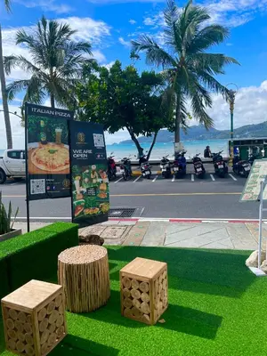a rendering of a park with benches and palm trees at Apartment Sea View Patong Beach in Patong Beach