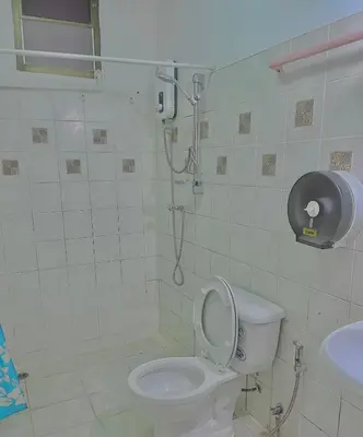 a bathroom with a toilet and a shower in it at Cozy Home With Lake View at Kathu PHUKET 3 BR in Ban Huai Luk (1)