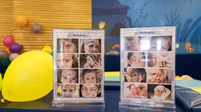 two clear plastic containers with a picture of a baby at Phuket Emerald Beach Resort in Karon Beach