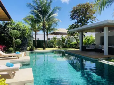 a swimming pool in the backyard of a house at Villa Jasmine - luxury private villa Bangtao Beach in Bang Tao Beach