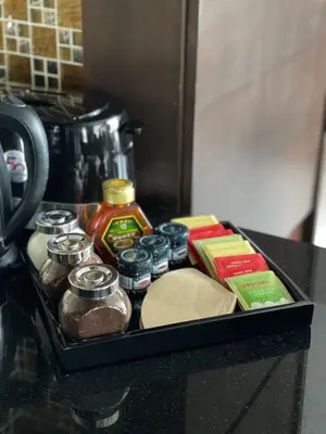a tray of food on top of a counter at The Regent Bangtao Apartments in Bang Tao Beach
