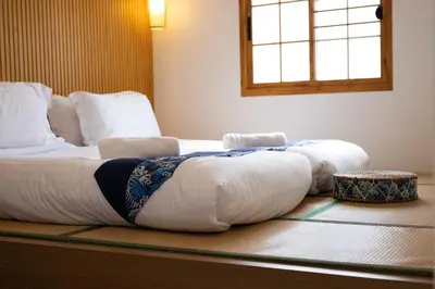 a bed with pillows on the floor in a room at Villa Sunrise Garden B191 in Thalang