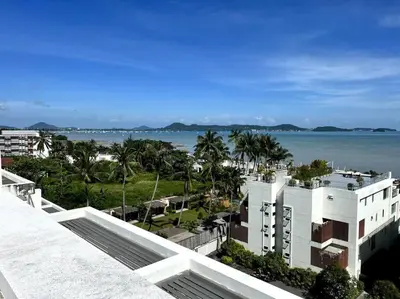 a view of the ocean from a building at Spectacular Ocean View Apartment in Ban Saiyuan (1)