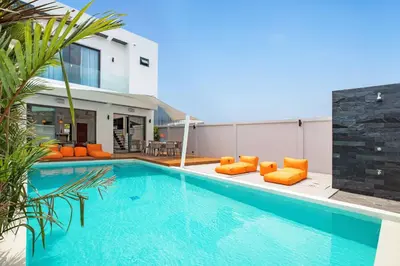an image of a swimming pool in a house at New & Elegant 5Br Pool Villa Samakki Garden 5 in Rawai Beach