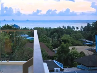 a view of the ocean from a balcony of a house at CORNER SEA VIEW KRABI Ao Nang 4 STARS HOTEL RESIDENCE in Ao Nang Beach