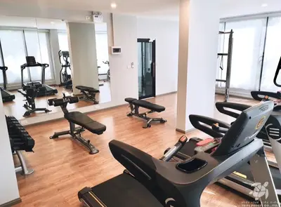 a gym with several treadmills and exercise bikes at В7 НОВАЯ КВАРТИРА ВАТСАП669З582I976 можно РУБЛЯМИ in Nai Yang Beach