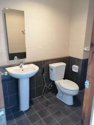 a bathroom with a toilet and a sink at Baan7984 Rawai in Rawai Beach