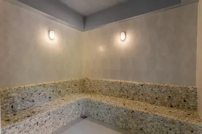 a bathroom with a tub with two lights on the wall at С8 С9 ВАТСАП669З582I976 принимаем РУБЛИ in Nai Yang Beach