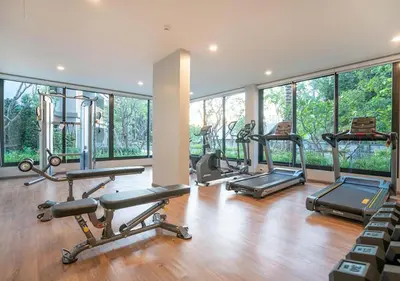 a gym with a bunch of exercise equipment in a room at С8 С9 ВАТСАП669З582I976 принимаем РУБЛИ in Nai Yang Beach
