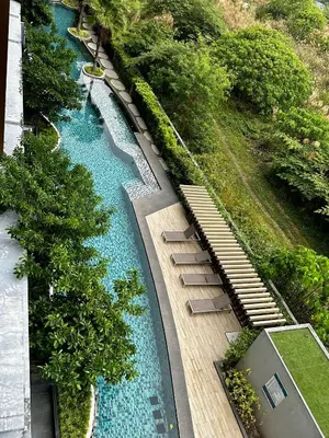 an overhead view of a river with stairs and trees at Aristo O59 Junior Suite Surin Beach in Phuket Town