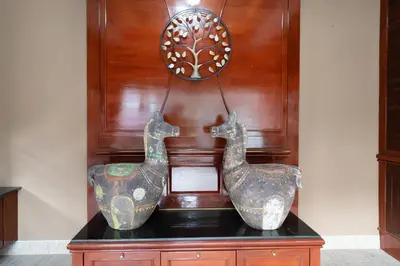 two vases sitting on top of a table at The Phuket Pool Villa in Phuket Town