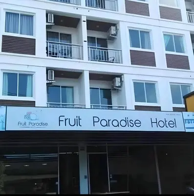 a building with a sign for a hotel at \u6c34\u679c\u5929\u5802\u65c5\u9986Fruit Paradise in Patong Beach